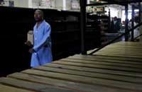 Not much to sell: empty shelves at a Harare supermarket. (Photo: Antony Kaminju/IRIN)