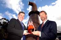 Sandy Hyslop (left), Ballantine's Master Blender, and Douglas Cruickshank, from Chivas Brothers, with the International Spirits Competition Distiller of the Year Trophy.