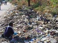 With the collapse of services, urban residents dump garbage at undesignated places. (Image: ff/IRIN)