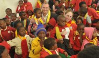 Craig Doré - Marketing Director of Consumer Healthcare GSK and Amanda Blankfield - Marketing Manager of MaAfrika Tikkun and the children of the Diepsloot community.