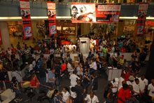 A view from the top balcony looking down at the event.