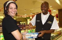 Vincent assists shopper Melinda van Tonder.