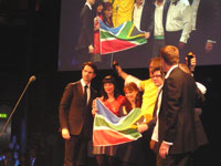The TBWA creative team collecting the coveted Black Pencil, a first for South Africa, as they displayed the SA flag with pride