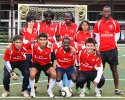 The team: From left, second row: Areti Theodorou; Teresa Yuol; Yom Mapiou; Hemanta Acharya with Coach Simon Bell. From left, first row: Mekhaled Al-anezi; Ahmed Thafer; Mubasher Hassan; Melvin Rivera.