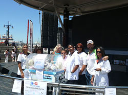 Staff celebrate the donation of an incubator.