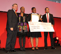 Dignitaries posing with Lorraine Chitate, Eteya second runner-up