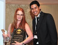 Rene Kohler-Thomas from SAB receives the award from Gavin Groenmeyer