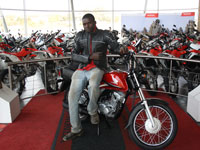 Honda Kyalami donates bike to shack fire victim