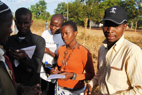 Journalists interviewing a source in one of the field trips