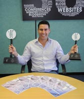 Colin Garden, national sales manager of RamsayMedia’s Custom Publishing division, displays the trophies and awards that came Toyota Zone’s way.