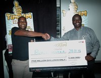 L to R: Boniface Munywoki and Patrick Waihenya, National Activations Manager, Kenya Breweries Limited