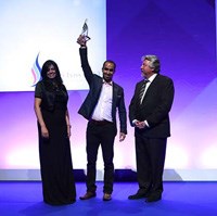 Muna Al Hashimi, General Manager of Batelco’s Consumer Unit, was on stage to receive the Award on behalf of Batelco.