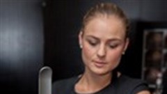 Nespresso barista Irene Jones (V&A Waterfront) using the Gran Maestria to prep a Nespresso Apricot Iced Coffee.