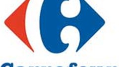 Carrefour reports return to profit, shares rise