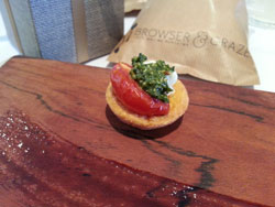 Parmesan cup filled with mozzarella, slow roast tomato and basil pesto