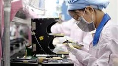 Workers at the Pegatron factory work at least 12 hours a day making Apple products. Image: