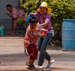 The Thai water fight - looks like more fun than some New Year's rituals. (Image: , via Wikimedia Commons)