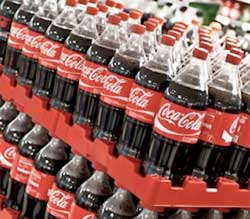 Coca Cola says it will probably close four bottling plants in Spain. Image: