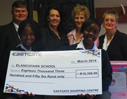 Back: Josua du Plessis (Elandspark School Principal), Hester Wasserfall (Eastgate Centre Manager) and Louise Duvenhage (Elandspark School Marketing) and Hettie van Niekerk (Elandspark School Teacher)<p>Front: Ruel Greene and Margaret Mayani (Elandspark School students)