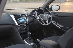 The cabin is liberally sprinkled with convenience features for both passengers and driver.