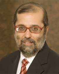 Communications Minister, Yunus Carrim is pleased that communications costs in South Africa have dropped. Image: GCIS