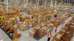Amazon's distribution centre in the UK. Twitter users can now connect their account to Amazon and add items direcly to their cart and then pay for them when they next log on. Image:
