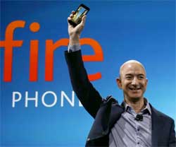Amazon's Jeff Bezos holds the new Fire smartphone aloft at the launch of the new device. Image:
