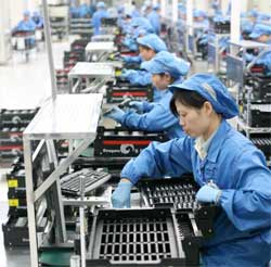 Workers at Foxconn's Taipei factory have helped boost Taiwan's exports by 10.6% as markets in the USA and Europe recover and demand for electronic products rises sharply. Image: