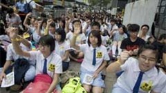 Thousands of students protesting in Hong Kong were tear-gassed by police last week. Then hacking group Anonymous threatened to sabotage &quot;all government websites&quot; and now five hackers have been arrested and detained. Image: