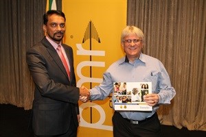 General Manager for Damelin Westridge, Rahman Kajee with the Damelin bursary recipient, Louis Botha of Blue Security.