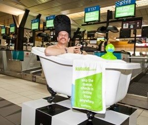Jack Parow, in the kulula bath at O.R Tambo International Airport encouraging online check-in from anywhere