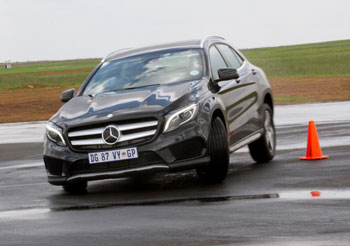 Forget about being glued to the tar – this new hot hatch and its stylish sedan sibling are welded, cemented and bolted to the road.