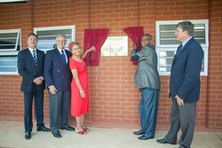 Mike Hall-Jones (left), Key Pietermaritzburg MD and Colin Cowie, chairman of the GM Childlife Foundation look on as Gishma Johnson GMSA corporate communications manager and school principal Selby Madlala reveal the plaque. With them is Grace College principal, Vincent Luksich (right)