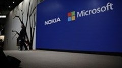 Microsoft cuts 7,800 jobs, reorganises phone unit