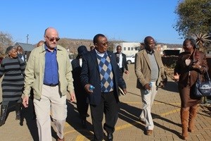 Kgosi Pilane, Morena Kagiso Pilane, MEC Desbo Mohono and Minister Derek Hanekom walking to Mphebatho Cultural Museum