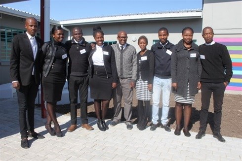 Youth from the community standing proudly outside their new Mbekweni Youth Centre