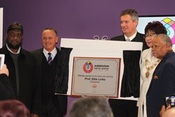 (L-R) Prof Mohammad Kaaran, Phil Roux, Lean Cronje, Mayor Gesie Van Deventer, Prof Eltie Links cutting the ribbon.