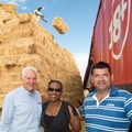 Aland Winde (Provincial Minister of Economic Development, Zukiswa Gaqavu (corporate affairs manager), Michiel Smuts (one of the farmers who has kindly donated some animal feed).