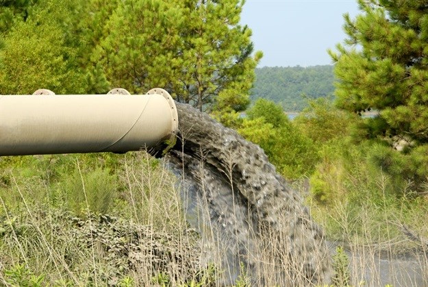 ‘Industrial pollution spilling into river system’ © Mark Winfrey –