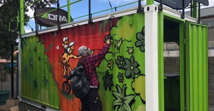 Street artist, Jace, at work