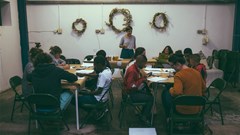 Alison Harris conducts a workshop with creative mentors and Woodstock youth.