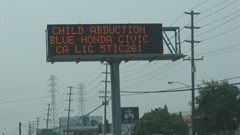 Amber Alert sign: Another example of the use of DOOH to locate missing/abducted children. Image ©  from Honolulu, Hawaii - ,