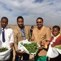 Paul Ntshabele of Sakata; Siviwe Mponzo, a St John's College student; Ndaba Mandela of Africa Rising Foundation; Rural Development and Agrarian Reform MEC, Mlibo Qoboshiyane; Nangamso Phuthumani of Milton Mbekela and KSD Mayor, Councillor Nonkoliso Ngqongwa showing off some of the vegetables seeds planted in 67 plots at Nelson Mandela's farm in Qunu as part of Nelson Mandela Day. Image credit: Mvusiwekhaya Sicwetsha