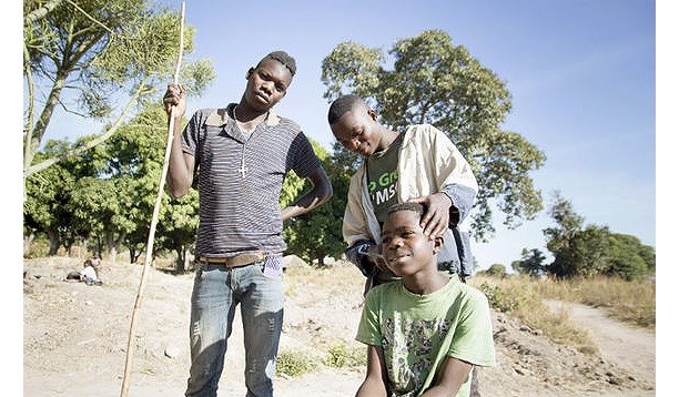 : African Agri Council - Stephen Kangwa (seated, 15) with friends Mwansa and Rabat. (Image taken by photographer Andrew Barker in an Irish Aid backed Self Help Africa project in remote Northern Zambia.)