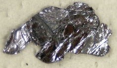 Chips of molybdenum sulfide. ,