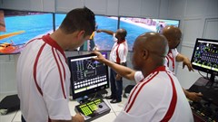 Simulation facilitators (left to right) Ebrahim Bayat, Thamsanqa Khanyile, Musa Ngubane and Vika Njoko demonstrate the equipment’s features at the Transnet Maritime School of Excellence in Durban. - Stephen Railton