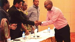 Paul Muhato, Managing Director of Engen in Tanzania shakes hands with the Prime Minister of Tanzania.