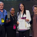 Primedia Lifestyle accepts the Gold Award for the Grocery Avenue campaign at Menlyn Park Shopping Centre, in the category of grand opening, expansion and/or renovation.
From left to right: Jeff Zidel, SACSC Fortress and President; Olive Ndebele, GM of Menlyn for Mowana Properties; Andrea De Wit, Marketing Manager of Menlyn for Primedia Lifestyle; and Amanda Stops, SACSC CEO.