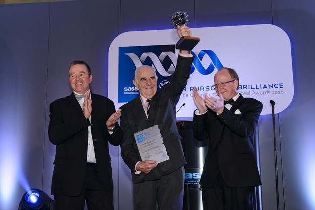 John Cluett celebrates winning the 2016 Sassda Columbus Stainless Steel Lifetime Achivement Award flanked by Sassda chairperson Charles Cammell and executive director John Tarboton.