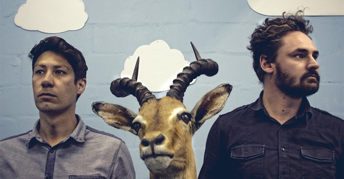 Kilmer & Cruise co-founders, photobombed by Bob, the office bokkie.